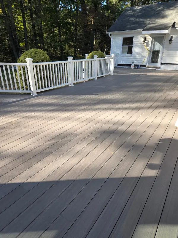 deck-white-railing-siding-exterior.webp