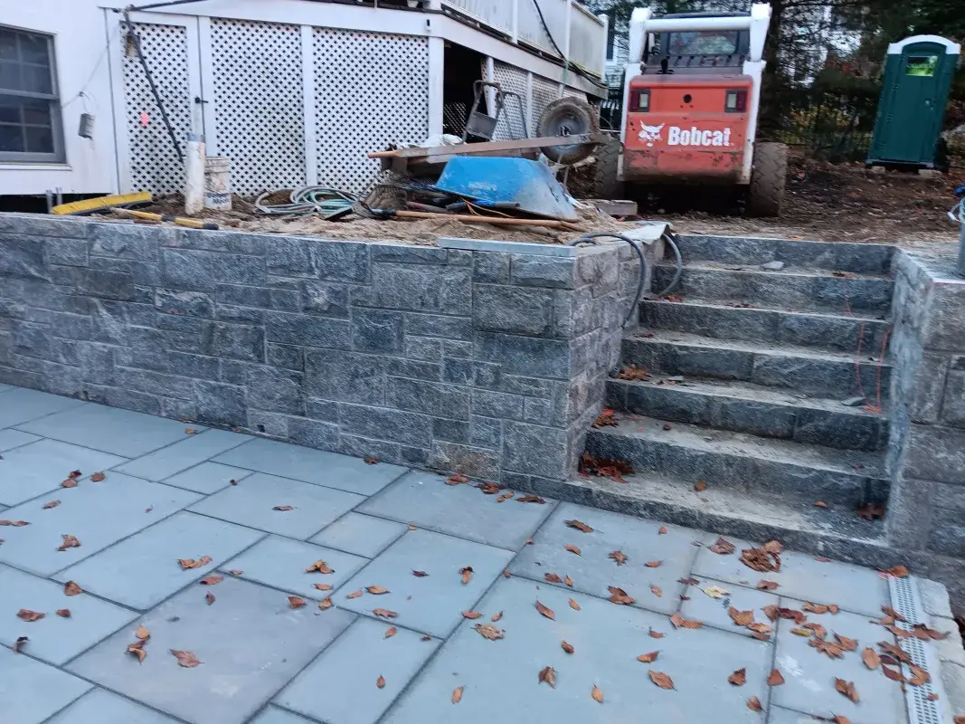 stone-retaining-wall-steps-tiles.webp