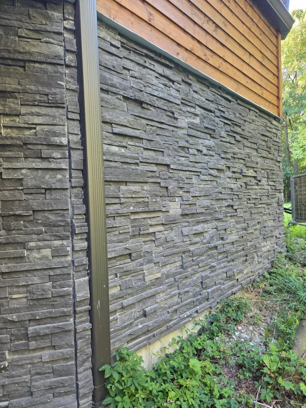 stone-veneer-wall-wood-siding.webp